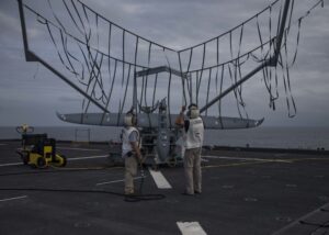 An Aerosonde Unmanned Aerial Surveillance (UAS) vehicle, named Buck G, returns to the Expeditionary Sea Base ship USS Hershel “Woody” Williams (ESB-4) from a 10- hour night surveillance in the Atlantic Ocean on Sept. 26, 2020. (Photo: U.S. Marine Corps by Sgt. Megan Roses/Released)