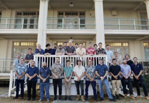 Twenty-eight ASC [formerly known as the Australian Submarine Corporation] personnel pose for a photo at Pearl Harbor Naval Shipyard and Intermediate Maintenance Facility (PHNSY & IMF), Joint Base Pearl Harbor-Hickam, Hawaii on July 16, 2024 as they start their SSN maintenance training to ultimately use in Australia. (Photo: U.S. Navy by Claudia LaMantia)