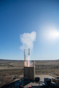 Lockheed Martin’s containerized low-cost Grizzly launcher firing a Hellfire missile in a live-fire vertical-launch test in 2026. (Photo: Lockheed Martin)