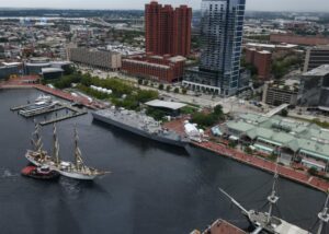 Danish training ship Danmark, left, prepares to dock next to the Freedom-class littoral combat ship USS Minneapolis-Saint Paul (LCS 21), middle, in Baltimore’s Inner Harbor on Sept, 7, 2022. Both ships were participating in Maryland Fleet Week and Flyover. (Photo: U.S. Navy by Mass Communication Specialist 2nd Class Griffin Kersting)