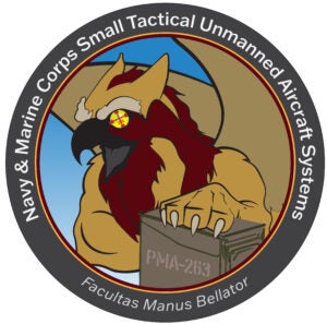 Logo of Navy and Marine Corps Small Tactical Unmanned Aircraft Systems Program Office, PMA-263.